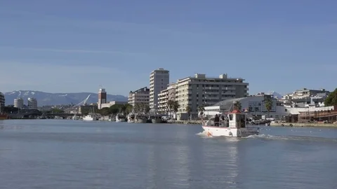 Pescara. View on the riverside during the return of a fishing boat Stock Footage 84091135