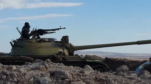 Peshmerga test fire Dushka machine gun on the Mosul front lines in Kurdistan. Stock Footage 56999077