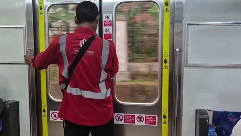 A pest control officer in a red uniform Video stock 338222283