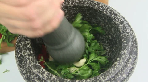Pestle Pounding Into Mortar Stock Footage 36610518