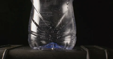 PET bottle compression Stock Footage 84593675