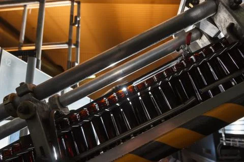 PET bottle on the conveyor belt before processing Stock Photos