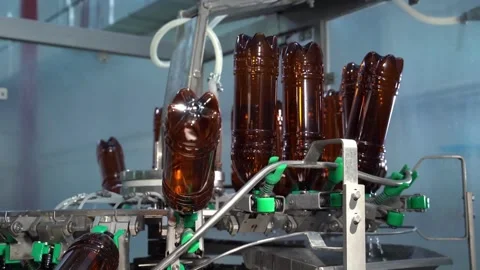 Pet Bottles on the Production Lines water bottle plastic industry factory food Video stock 334588198