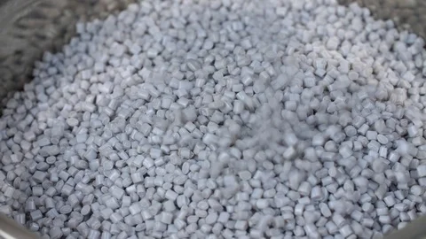 PET Recycled Plastic Raw Polymer White Granules Falling Stock-Footage 123234324