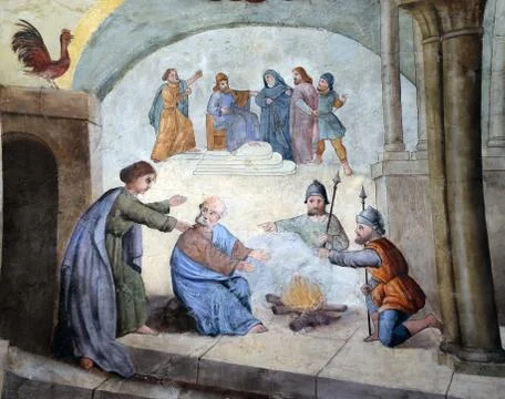 Peter denies Jesus before the rooster crows three times Stock Photos