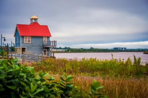 Petitcodiac River with dramatic sky, Bore Park, Moncton, New Brunswick, Canada Stock Photos