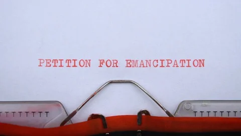 Petition for emancipation - phrase printed on an old typewriter in red letters Stock Footage 128400832
