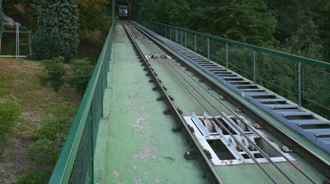 Petrin funicular railway going down from Petrin hill station in Prague Stock Footage 59536464
