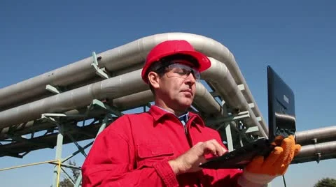 Petrochemical Engineer Using Laptop Stock Footage