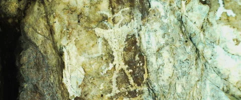 Petroglyph humanoid with horns Stock Footage 168245972