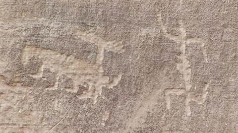 Petroglyphs on rock Stock Footage 61575275