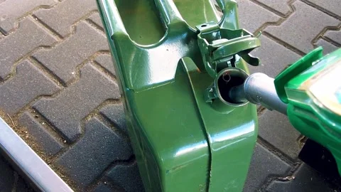 A petrol can is refilled Stock Footage 281064046