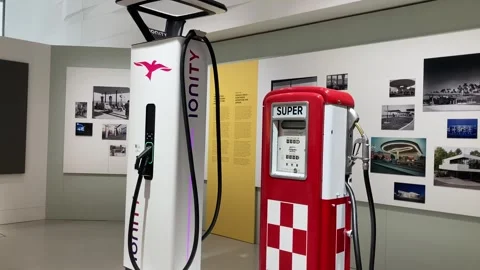 Petrol pump next to electric power station Stock Footage 336203375