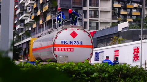 Petrol station: Workers detected tanker Stock Footage 59791040