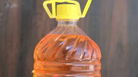 Petrol in Transparent Plastic Bottle Stock Footage 330738567