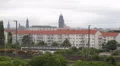 Petroleum Cisterns Oil Tanks Wagons Car Moving Train Passing Dresden Skyline Day HD Footage