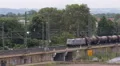 Petroleum Cisterns Oil Tanks Wagons Cars Moving Train Passing Import Goods Load HD Footage