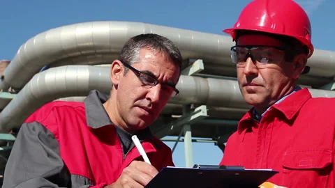Petroleum Engineers Handshaking Over Signed Contract Stock Footage 170463153