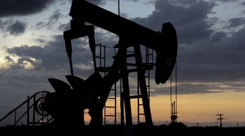 Petroleum pumpjack silhouette Stock Footage 51258623
