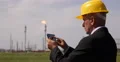 Petroleum Refinery Electronic Device Engineer Check Environmental Pollution Data 4k or 4k+ Resolution