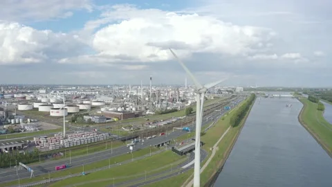 Petrolium storage + windmill [Drone shot] Stock Footage 131649742