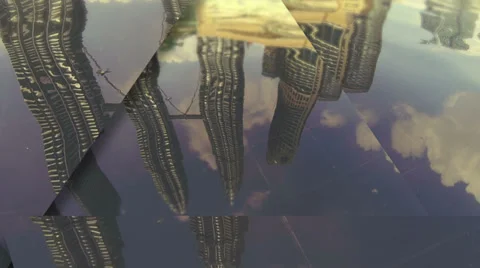 Petronas Towers dancing in the water reflection. Stock Footage 32940080