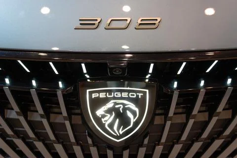 Peugeot 308 EV front shield logo and emblem close-up at ECAR Show 2026 스톡 사진