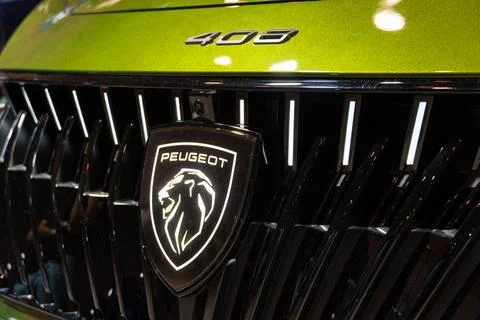 Peugeot e-408 EV front grille and shield logo at ECAR Show 2026 Stock Photos