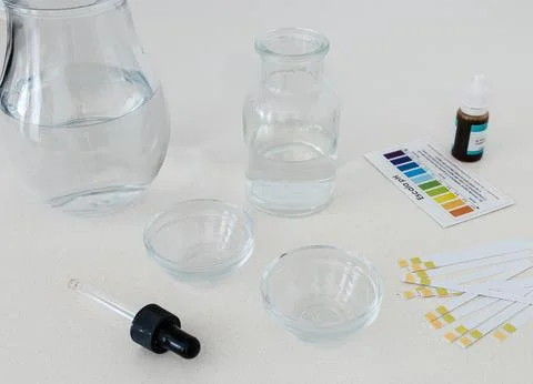 PH Test of Drinking Water Using Color Indicator to Assess Water Quality Stock Photos