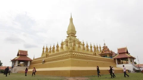Pha That Luang is a gold-covered large Buddhist stupa in Vientiane, Laos. Stock Footage 75334773
