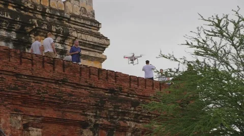 A phantom 3 pro drone flying by famous Myanmar Pagoda Stock Footage 53517673