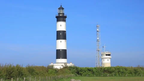 Phare de Chassiron lighthouse and semaphore tower in Saint-Denis-d'Oléron France Stock Footage 277258221