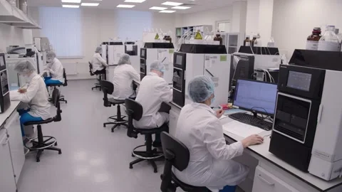 Pharma workers during the daily working process in the laboratory. the medical Stock Footage 199685444