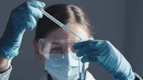 Pharmaceft in the chemical laboratory is working on development new drugs for Stock Footage 290116167