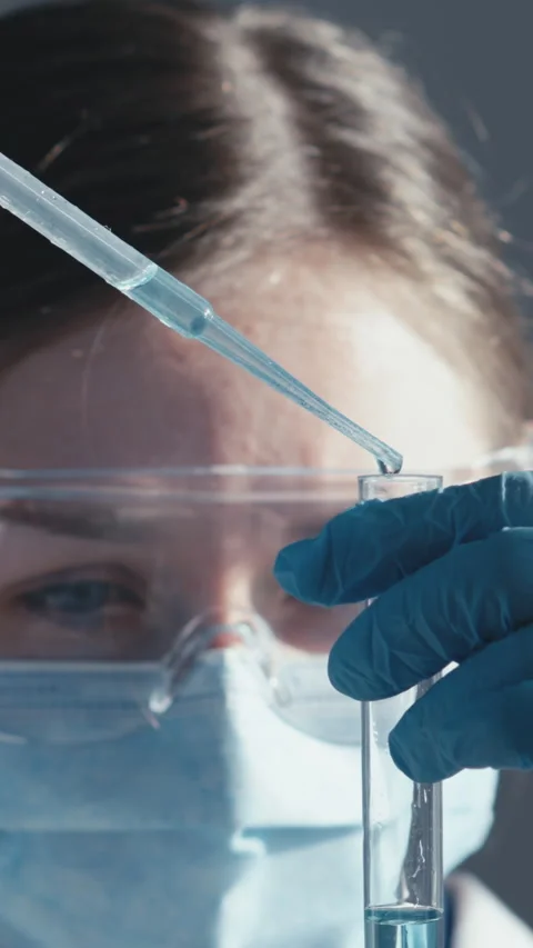 Pharmaceft in the chemical laboratory is working on development new drugs for Stock-Footage 293208452