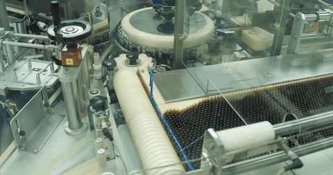 Pharmaceutical ampoules on conveyor. Stock Footage 101098636