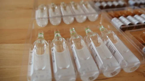 Pharmaceutical Ampules on the Table Stock Footage 48321005