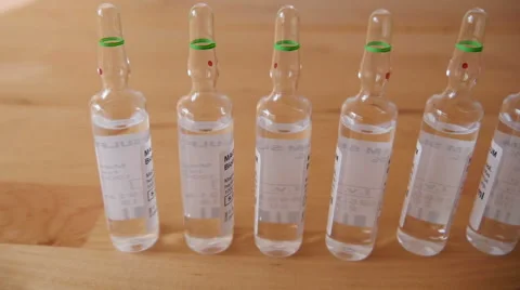 Pharmaceutical Ampules on the Table Stock Footage 48385420
