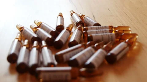 Pharmaceutical Ampules on the Table Stock Footage 48408958