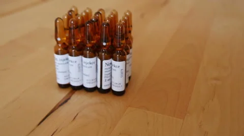 Pharmaceutical Ampules on the Table Stock Footage 48409264