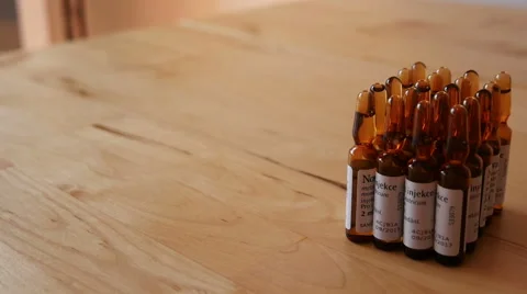 Pharmaceutical Ampules on the Table Stock Footage 48409392