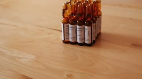 Pharmaceutical Ampules on the Table Stock Footage 48409553