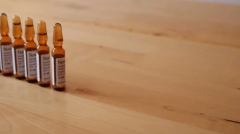Pharmaceutical Ampules on the Table Stock Footage 48409708