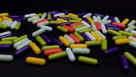 Pharmaceutical capsules on a rotating stand Stock Footage 252792270