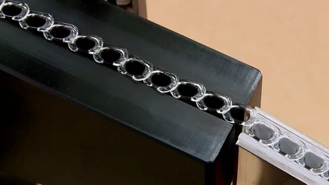 Pharmaceutical factory empty vials on the conveyor for the production Stock-Footage 70555872