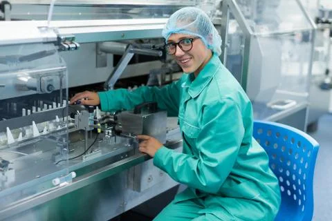 Pharmaceutical factory worker at the workplace Stock Photos
