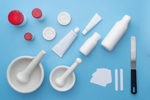 Pharmaceutical lab equipment ,flat or top view on white and blue table. For o Stock Photos