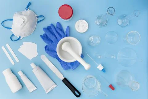 Pharmaceutical lab equipment ,flat or top view on white and blue table. For o Foto stock