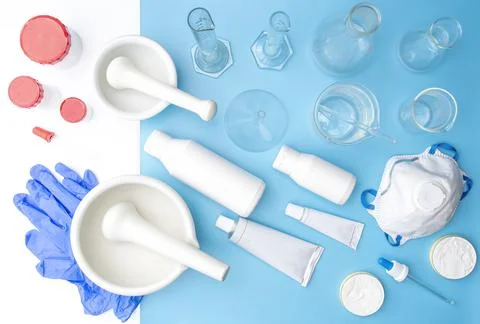 Pharmaceutical lab equipment ,flat or top view on white and blue table. For o Stock Photos