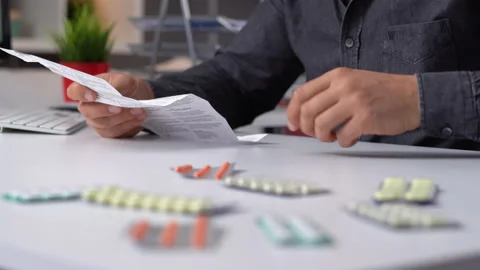 Pharmaceutical leaflet and internet search. Stock Footage 167110579